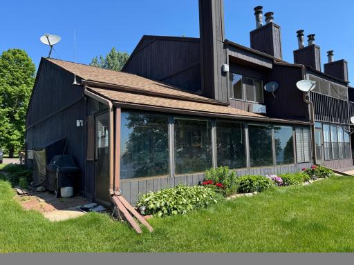 There is a screen door to access the lake side area and have a grill.