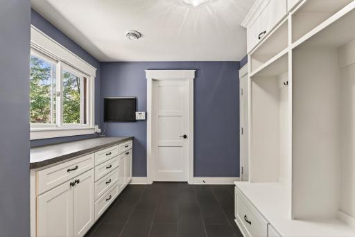 Large mudroom and walk-in closet off the garage