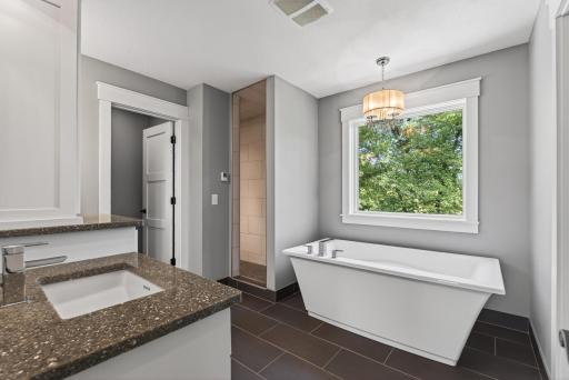 Primary ensuite bathroom with heated floors