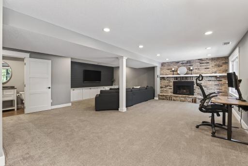 The spacious lower level was renovated in 2018 and provides space for entertaining, play and work