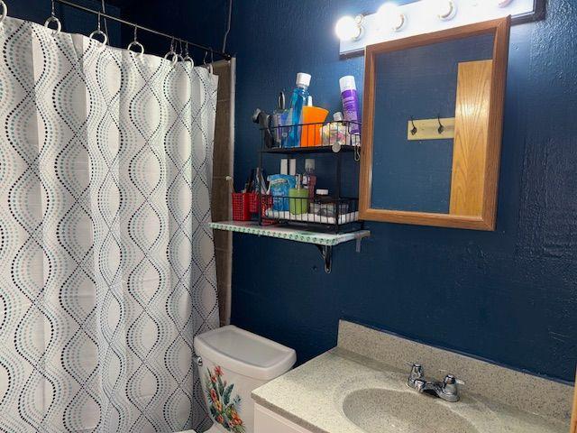 Ceramic tiled lower level 3/4 bathroom