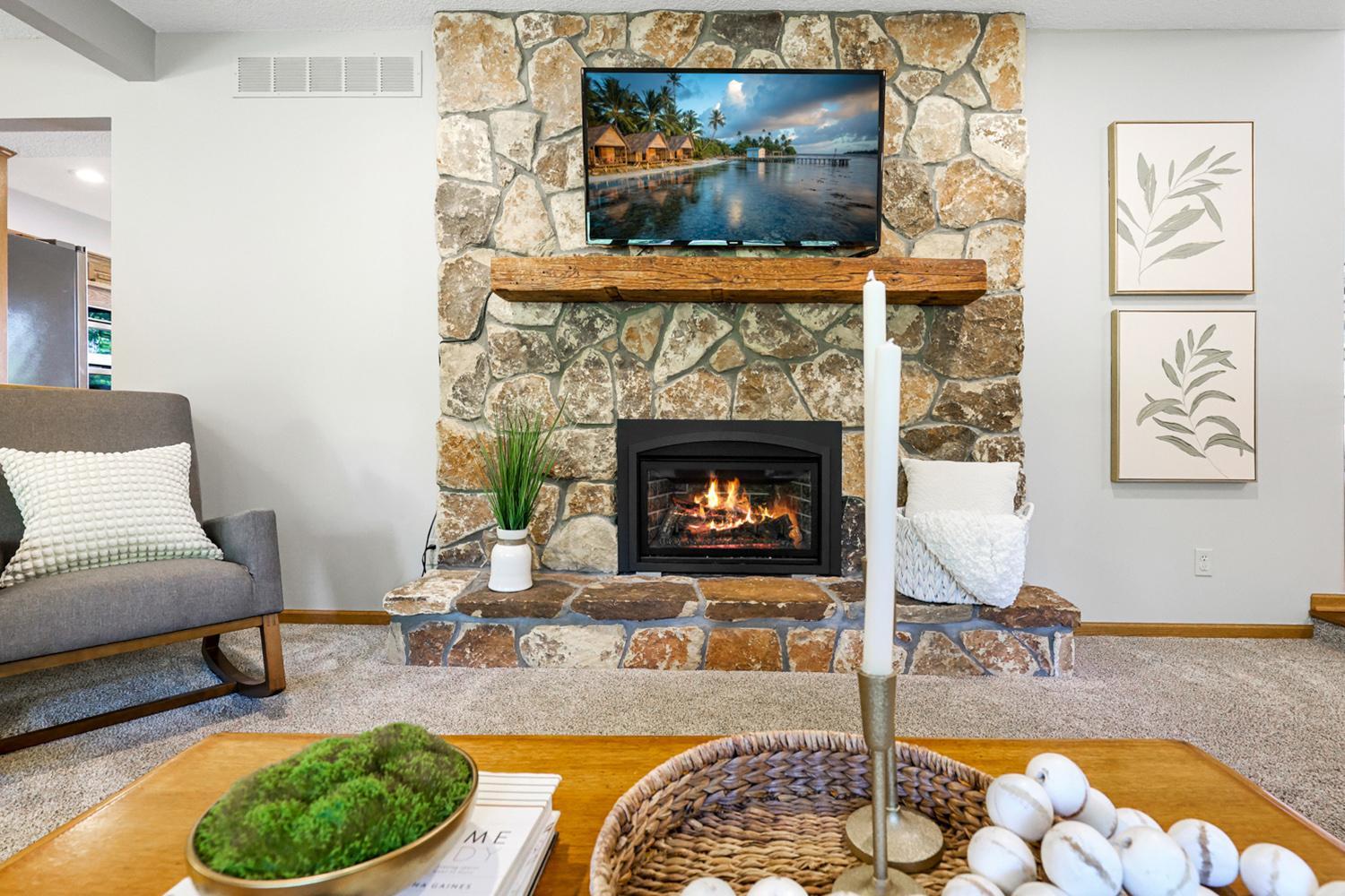Stone surround and wood hearth for your TV.