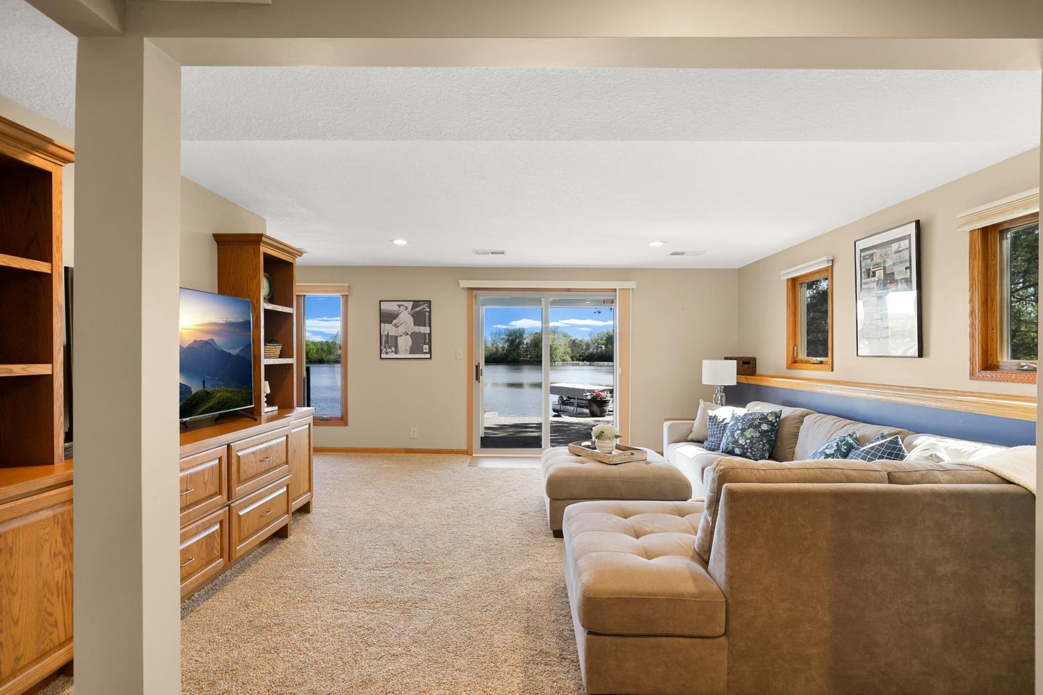 Lower level living room with beautiful views of Crystal Lake