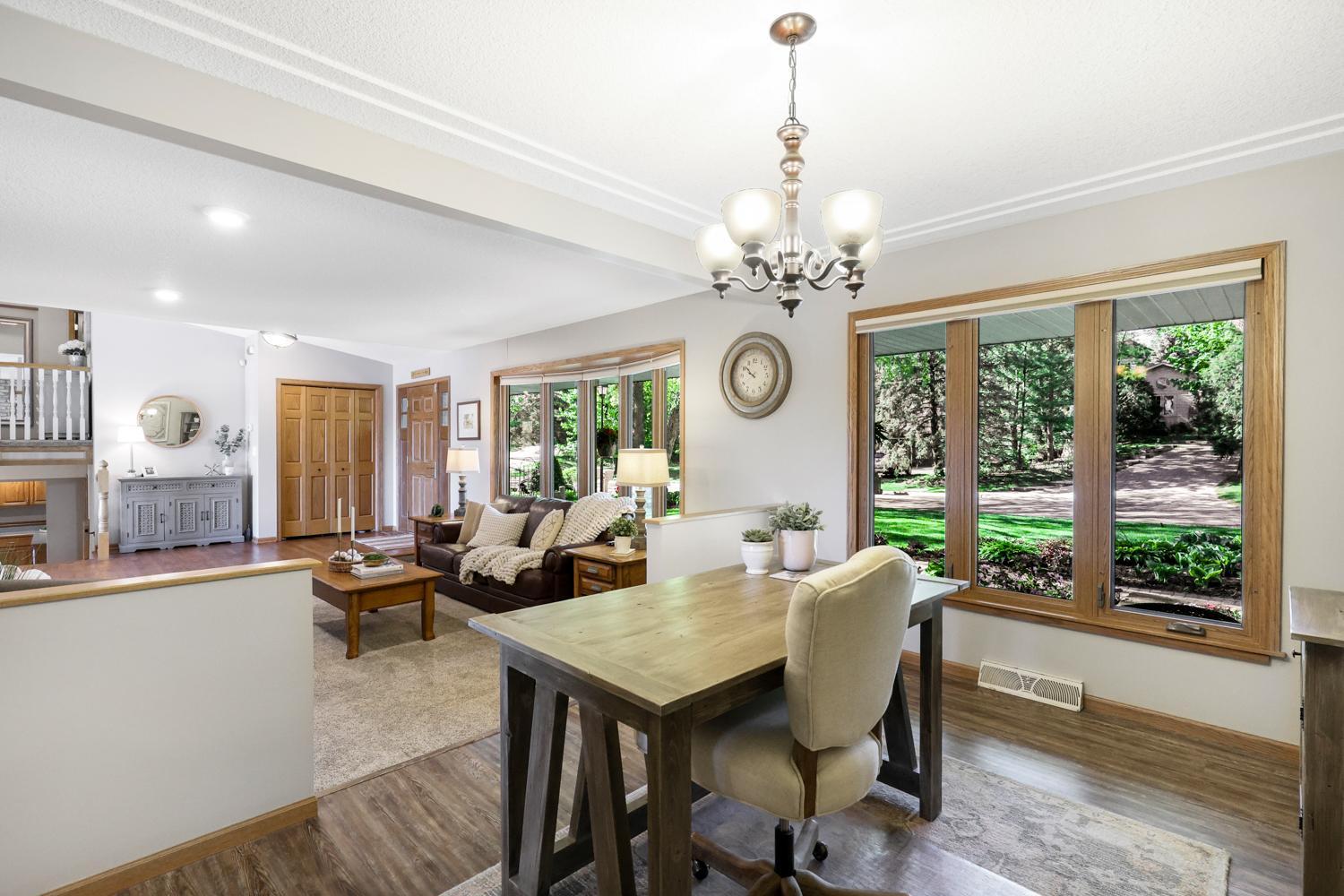 Large windows bring in an abundance of natural light throughout the home