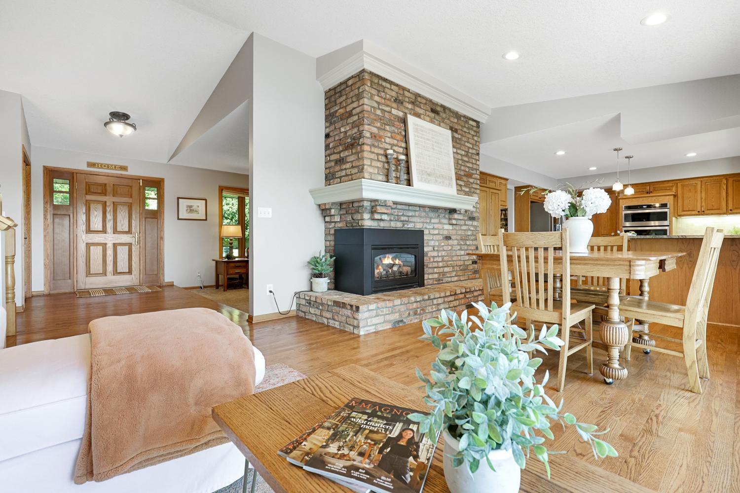 Beautiful open main level featuring rich hardwood floors and a second main floor gas fireplace.