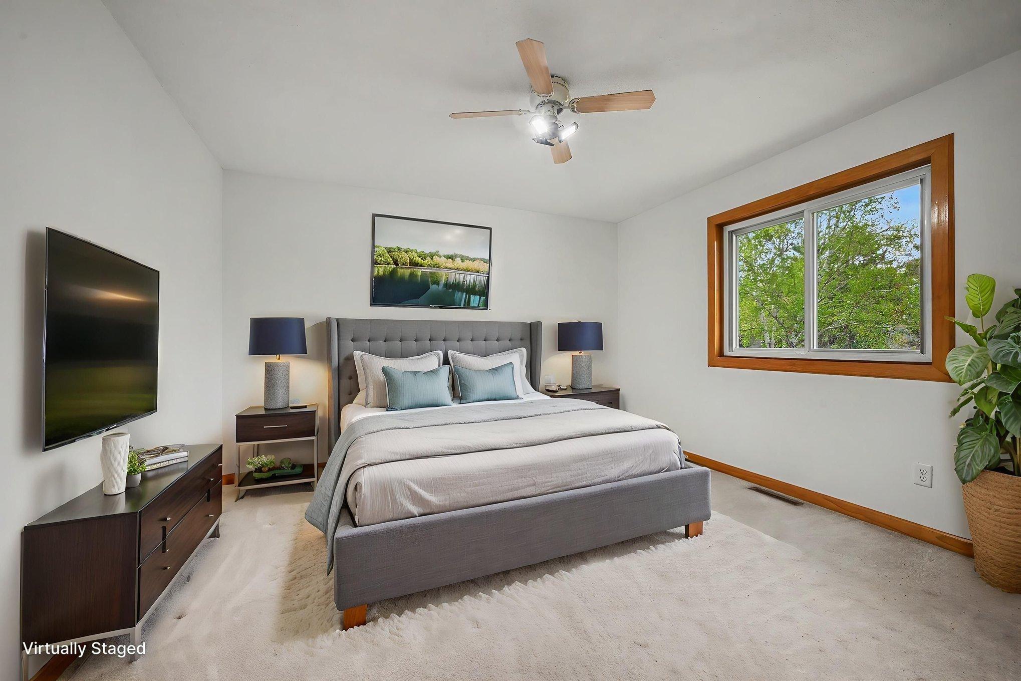 Bedroom two upper level virtually staged