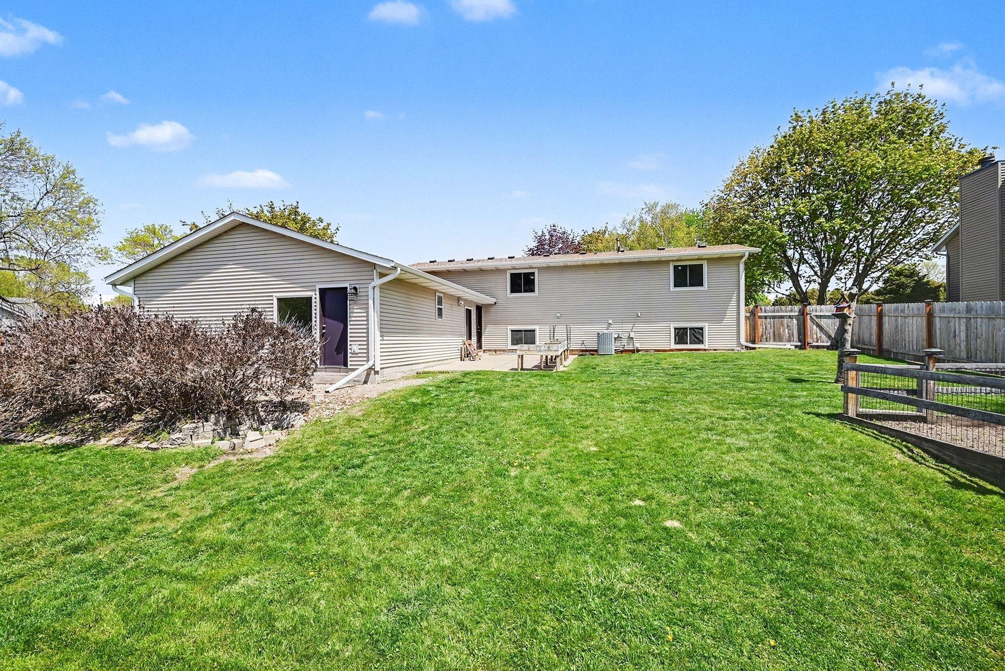 Access to backyard from garage and home has gutters