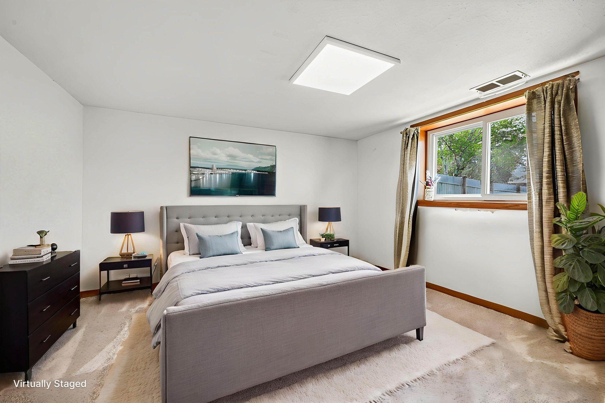 Third bedroom lower level virtually staged