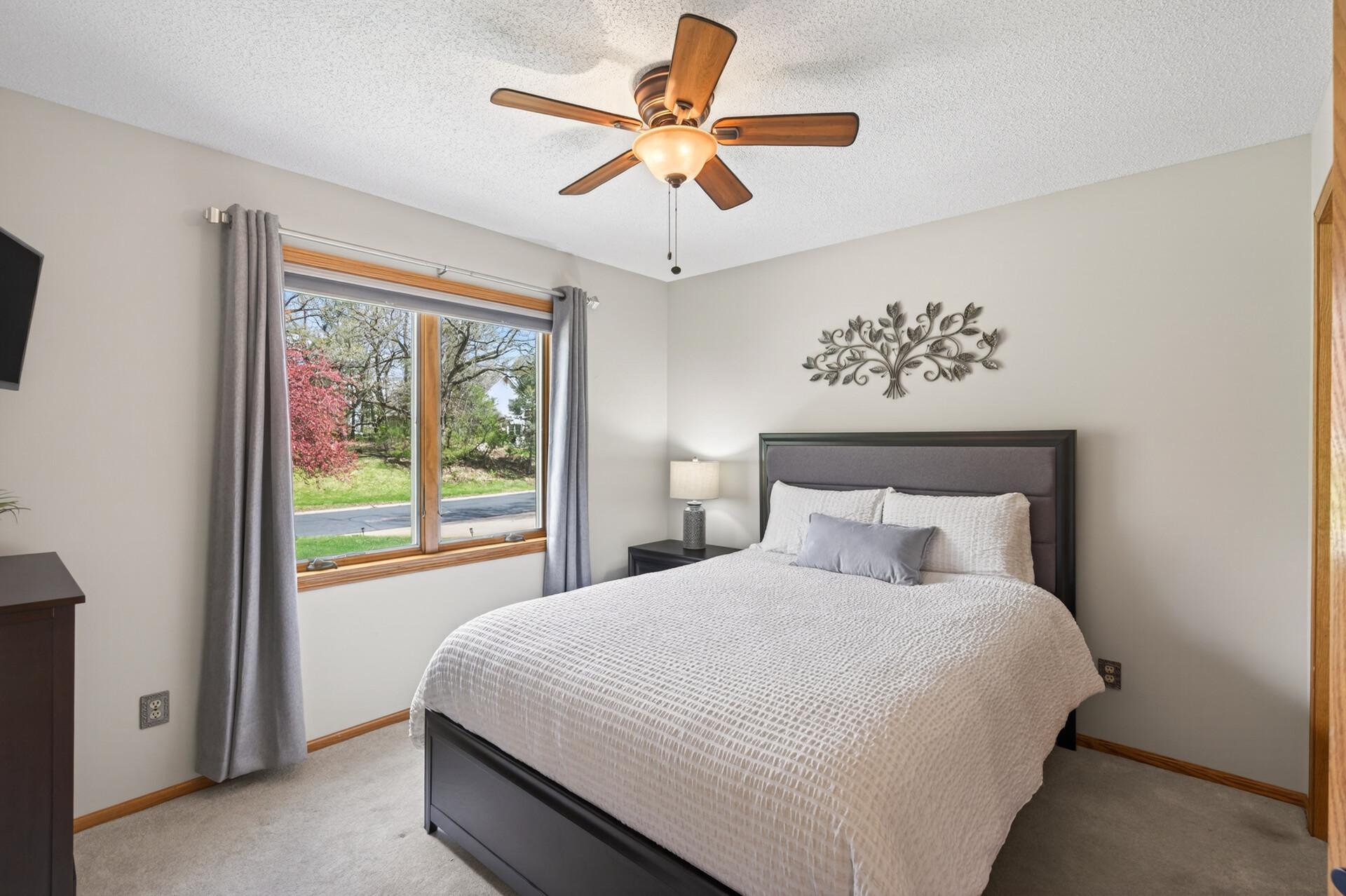Big and bright windows in this main level bedroom