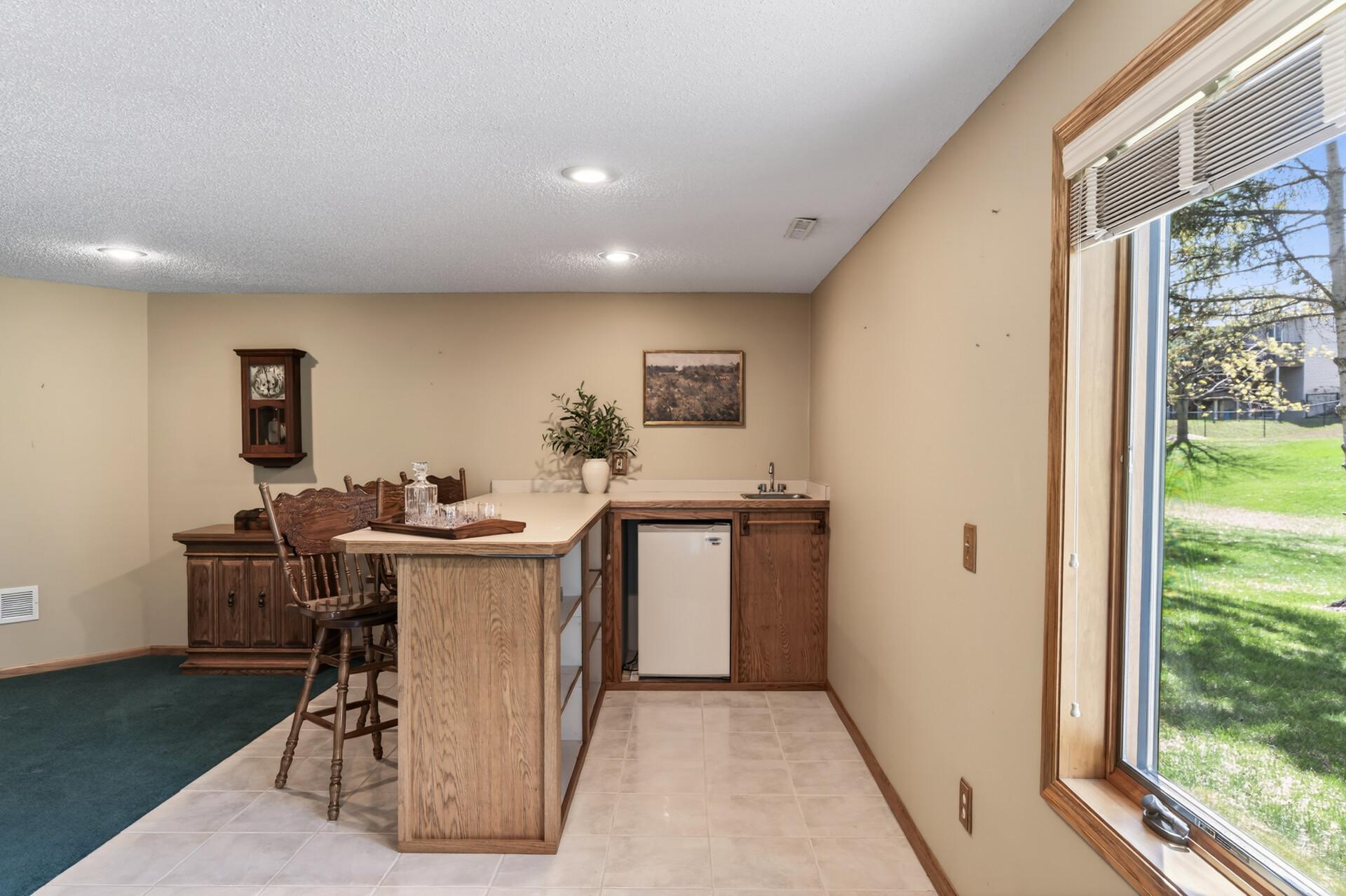 Entertainers dream basement with a wet bar