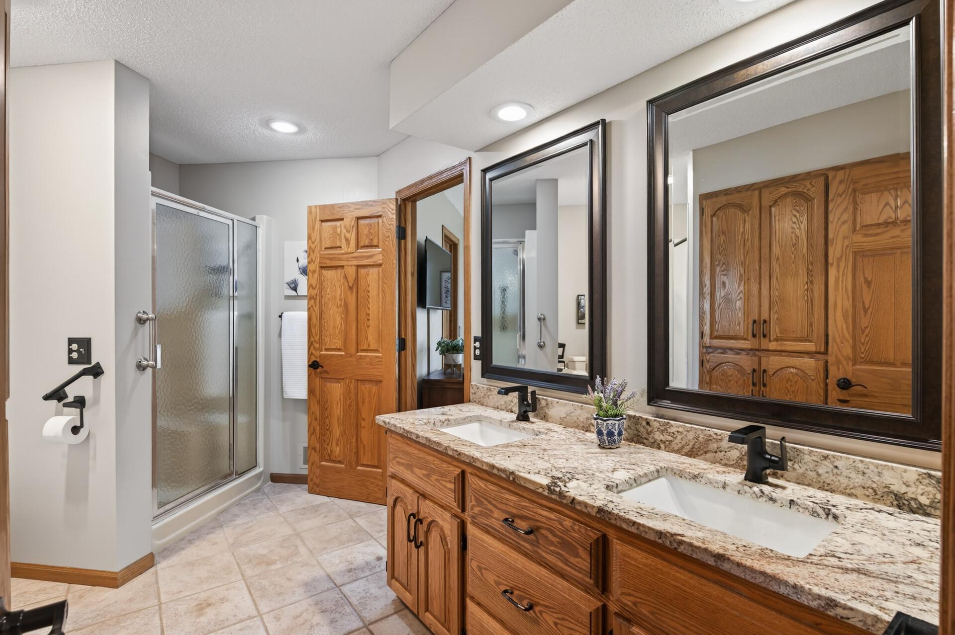 Custom granite countertops in the main level bathroom