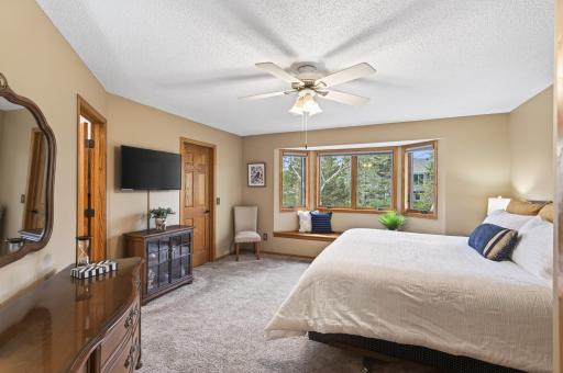 Primary bedroom with an abundance of natural light