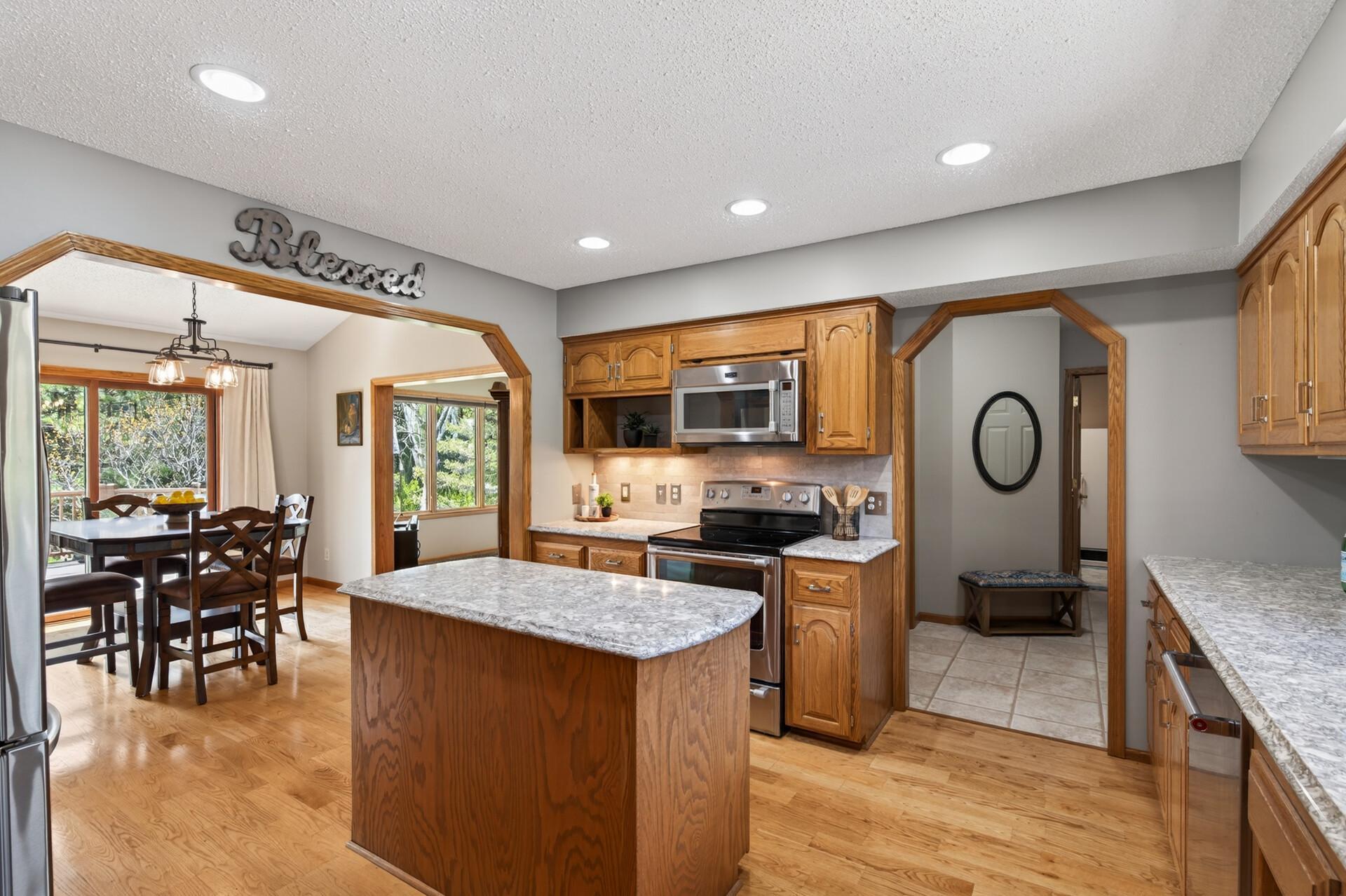 Custom kitchen open into the informal dining room