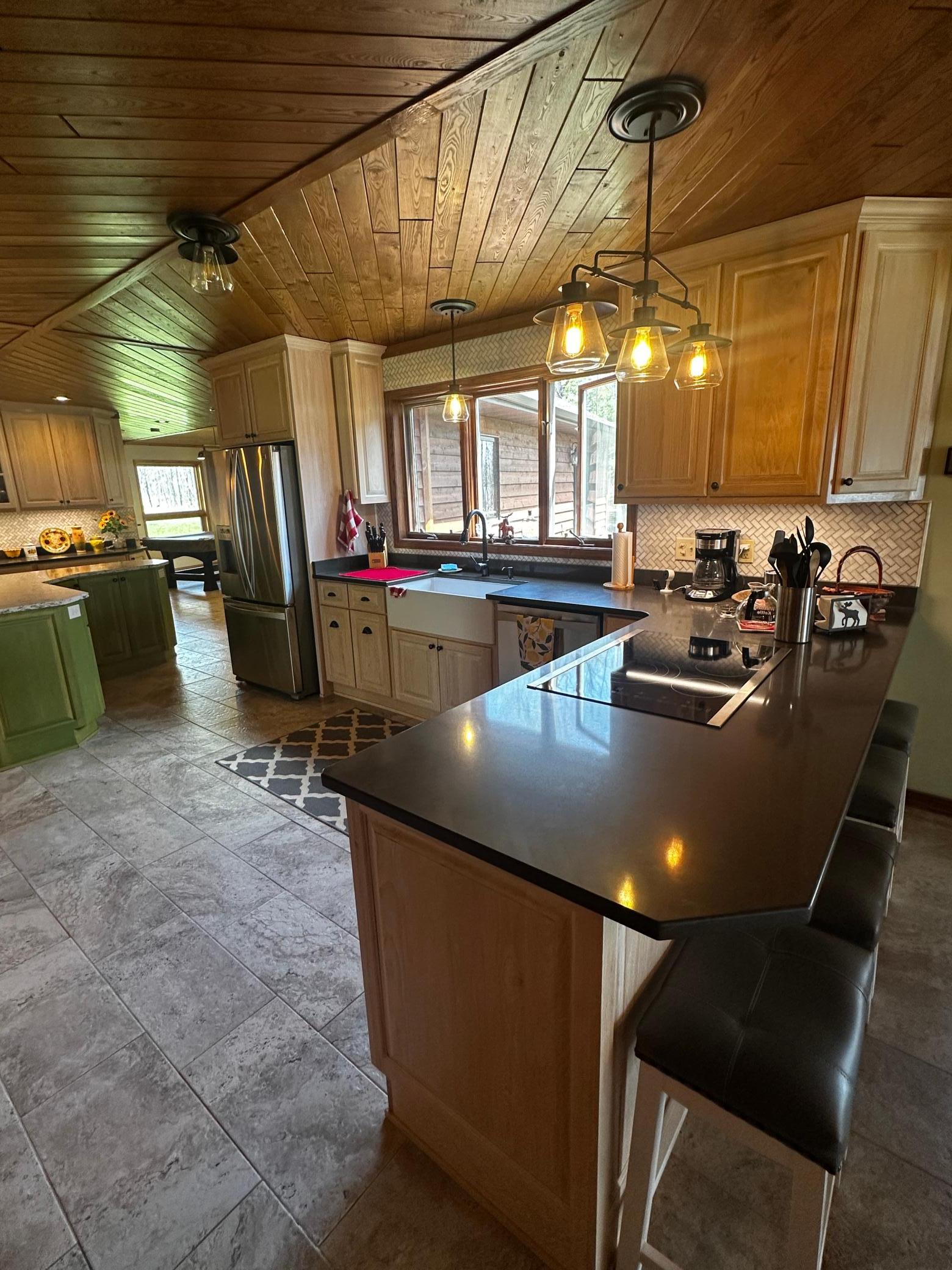 Creative Wood Masters custom white hickory cabinetry.