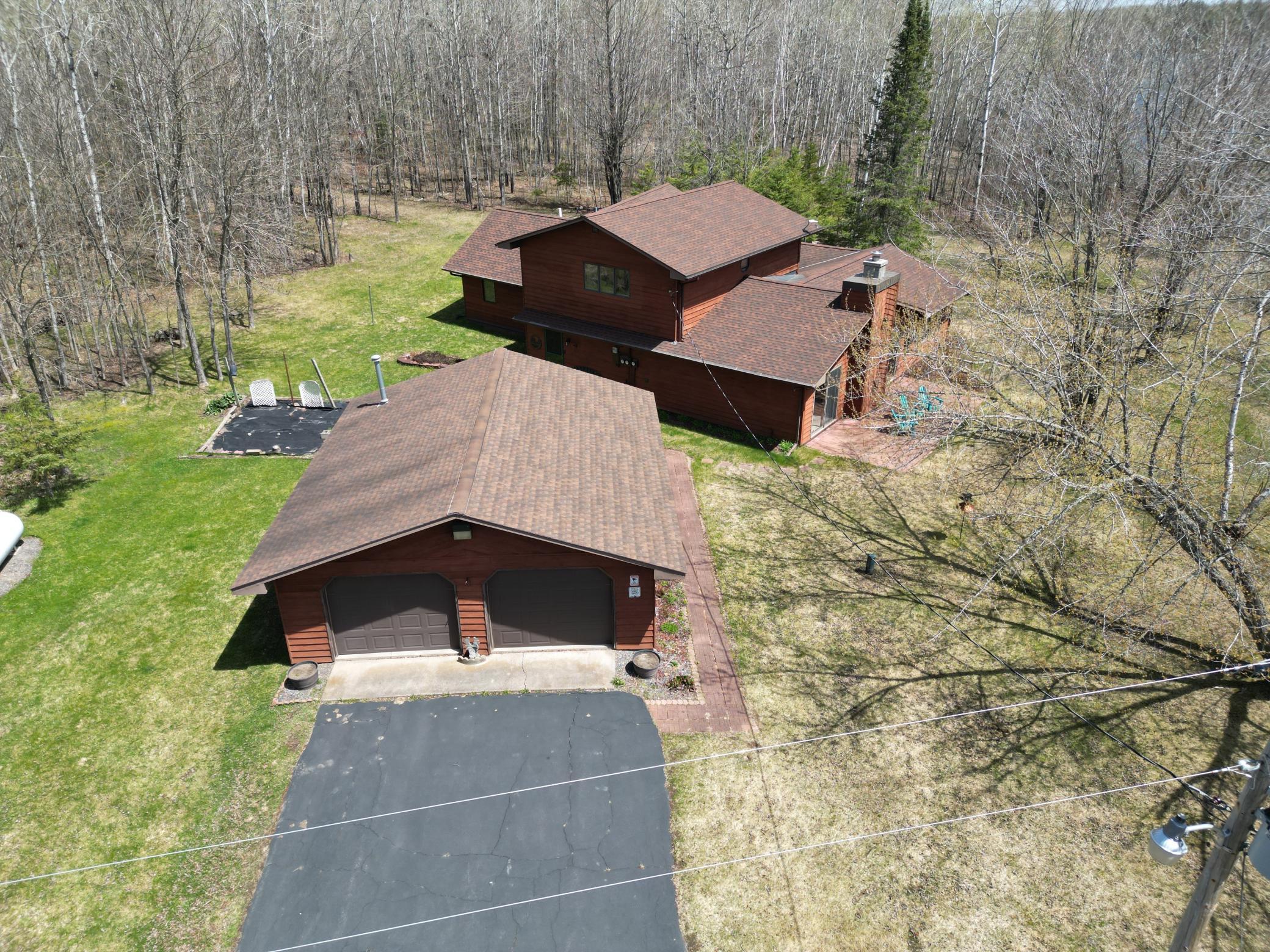 Main home and "close garage" which is a heated 2 car garage plus storage space.