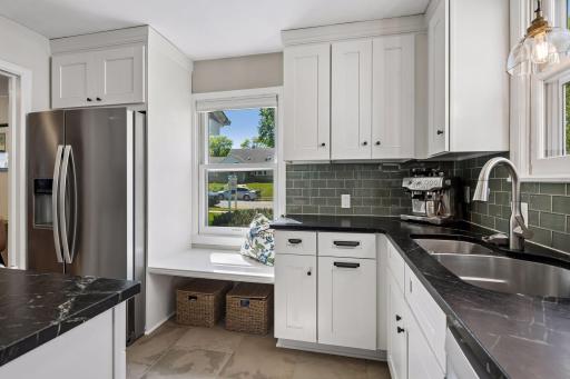 Notice home bright this kitchen is! Two kitchen windows that fill it with light!