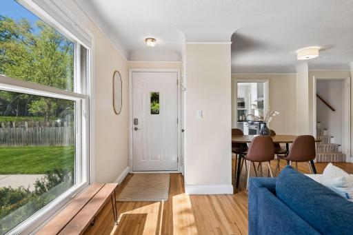 This home is light and bright. The sunshine drenches all the rooms within. Check out these original, gleaming hardwood floors.