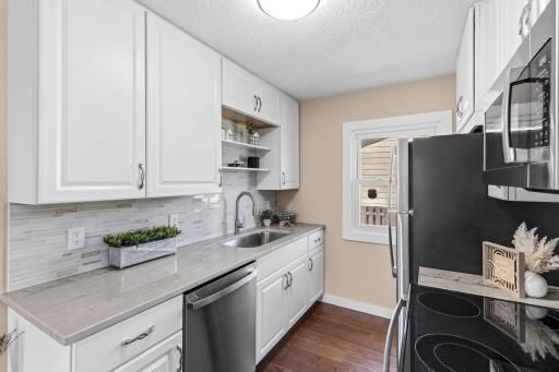 Tile backsplash, solid surface countertops