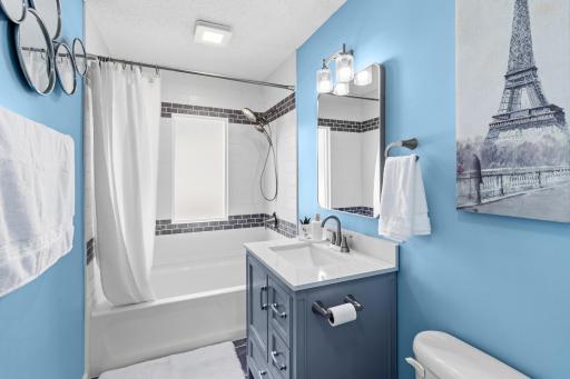Main level bath, tile surround & floor new tub/sink/toilet