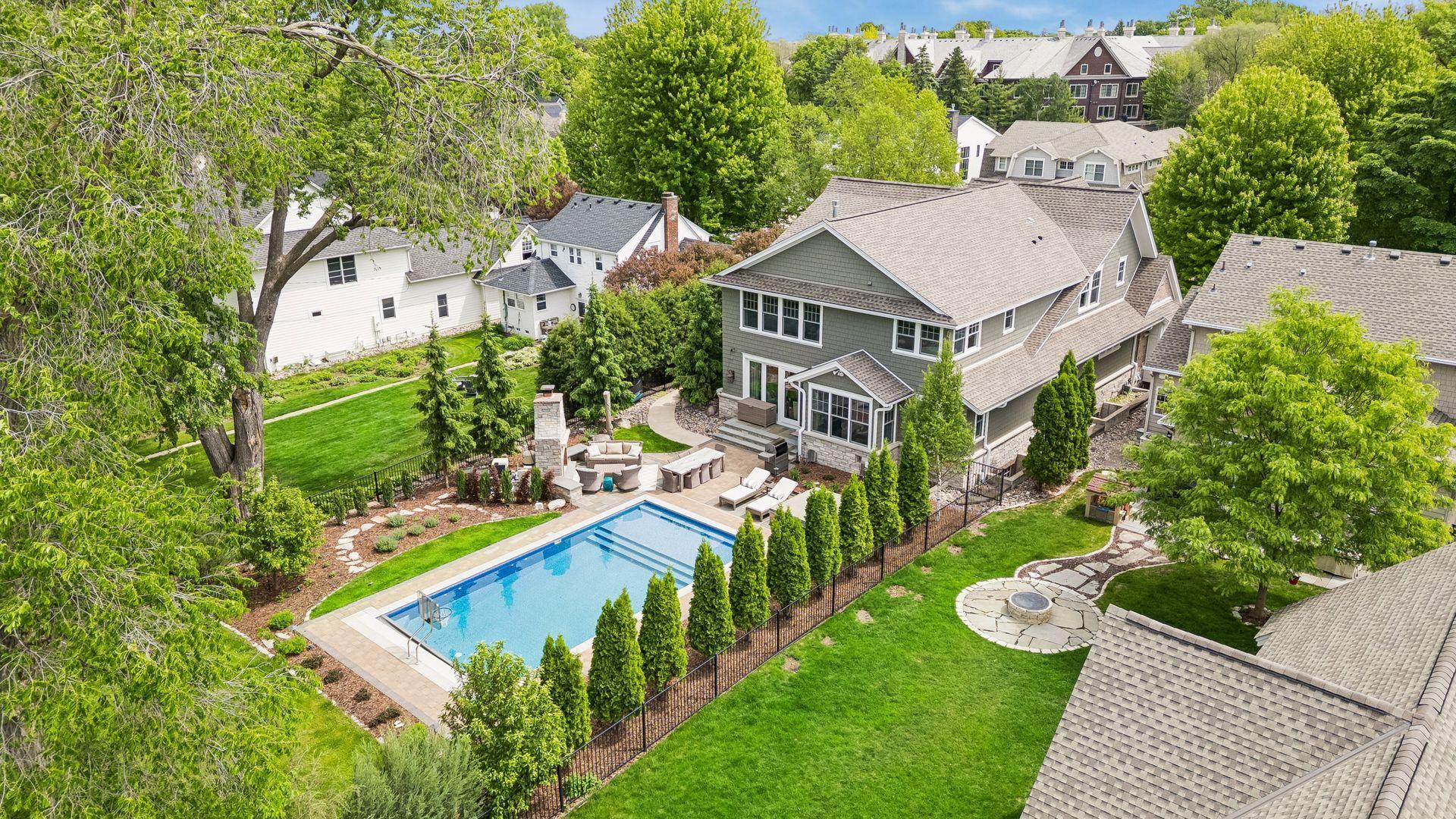 Fabulous backyard with gas fireplace, pool, and hot tub