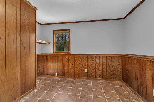 Another view of the basement bedroom. This would make a great office space as it does not have a closet.