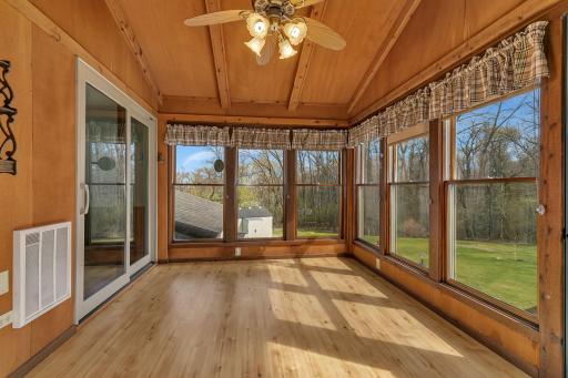 Another view of the four season porch looking North. Great space to be able to expand when entertaining.