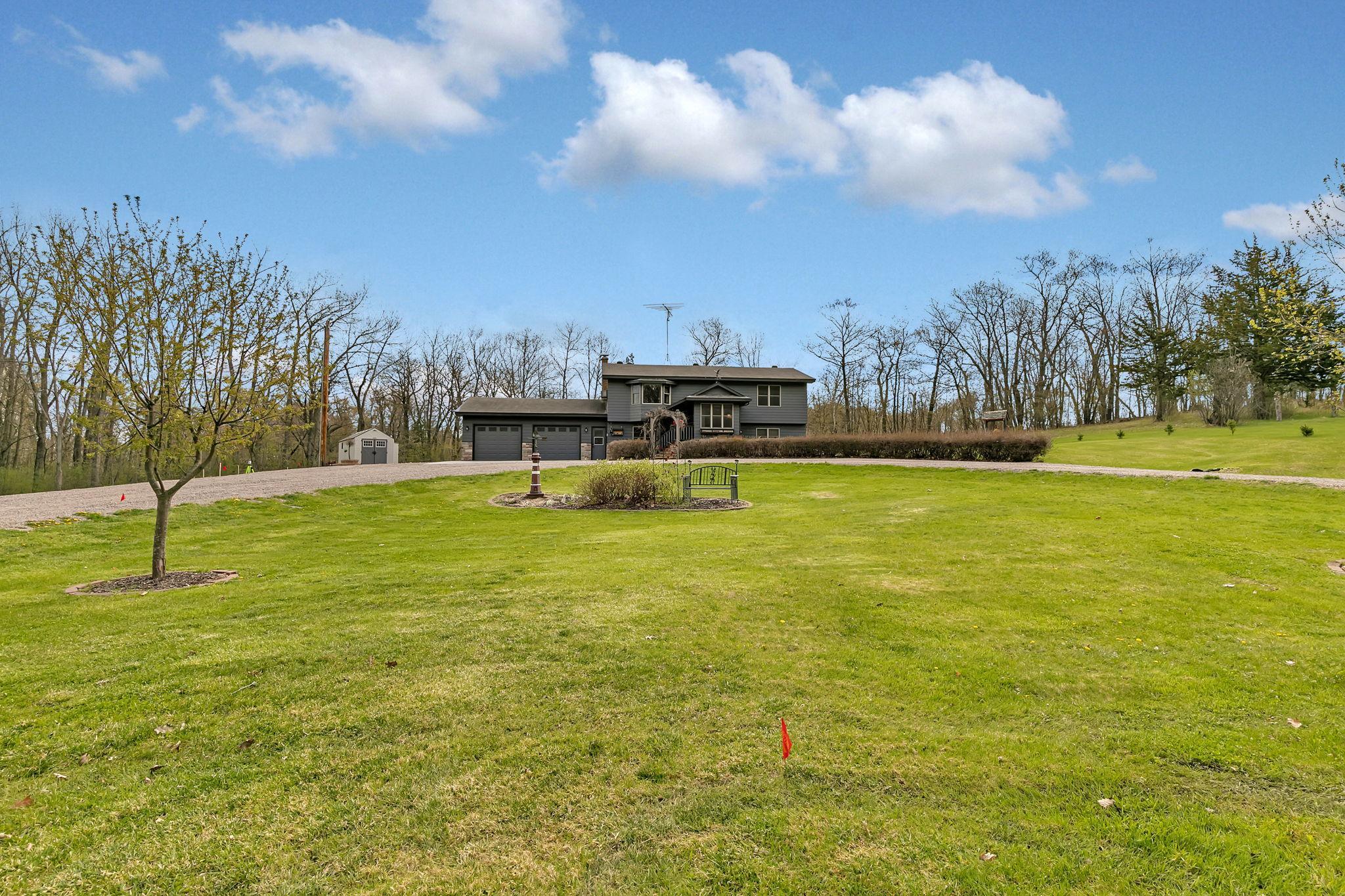 Large front yard offers even more green space to enjoy.