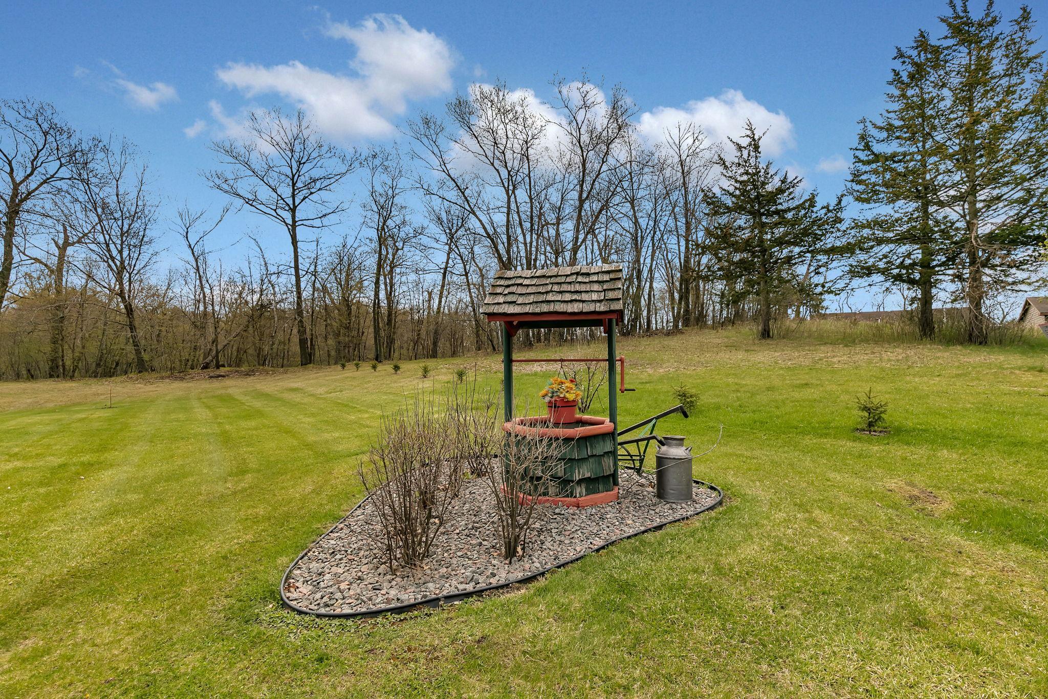 Make a wish. This wishing well is just one of many cute features throughout the property.