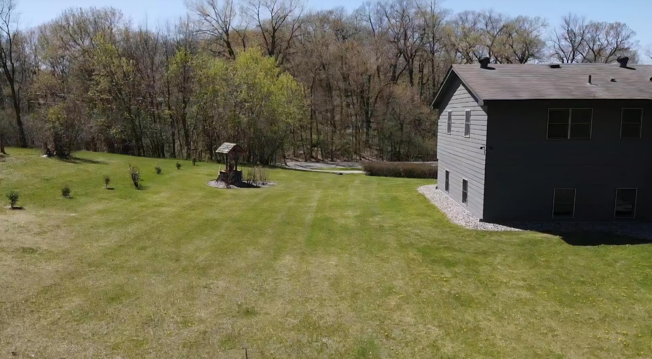 Large side yard works perfect for yard games.