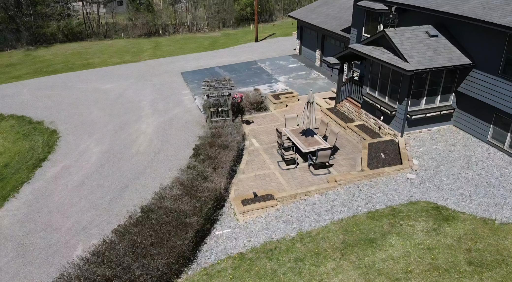 Your front patio will look amazing when your raised beds are in full bloom. Patio table, chairs, & umbrella will stay with the property.