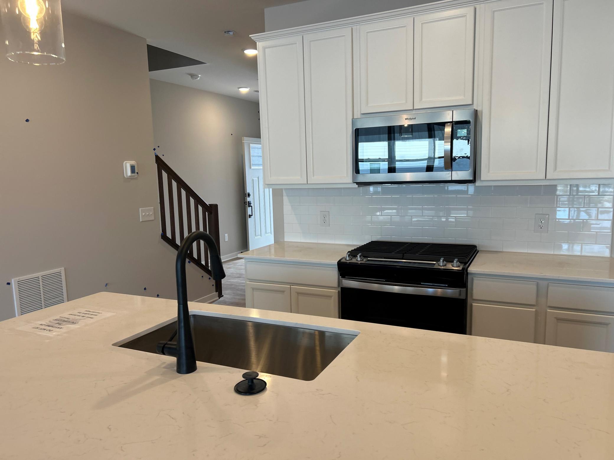 Subway tiled kitchen backsplash