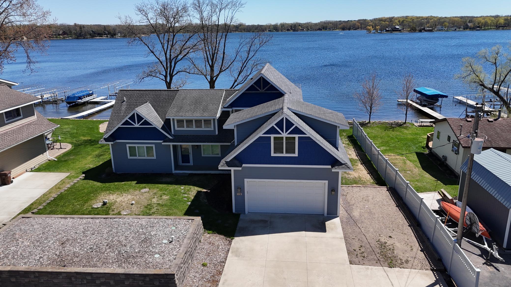 Thoughtfully designed Annandale home that complements the natural setting on the shores of Sugar Lake, featuring 85 feet of shoreline.