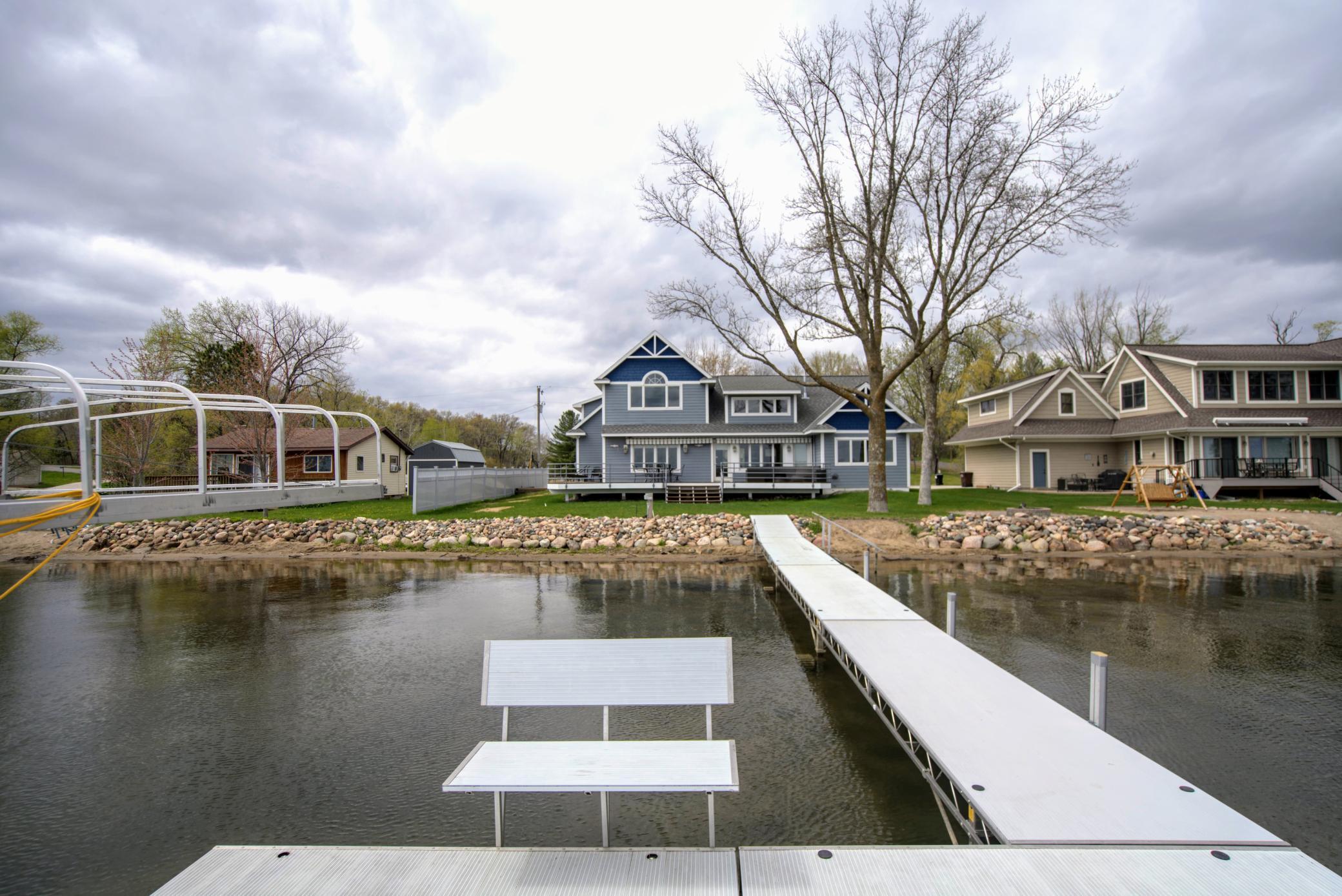 This is lake life at its best--welcome to your new lake retreat.