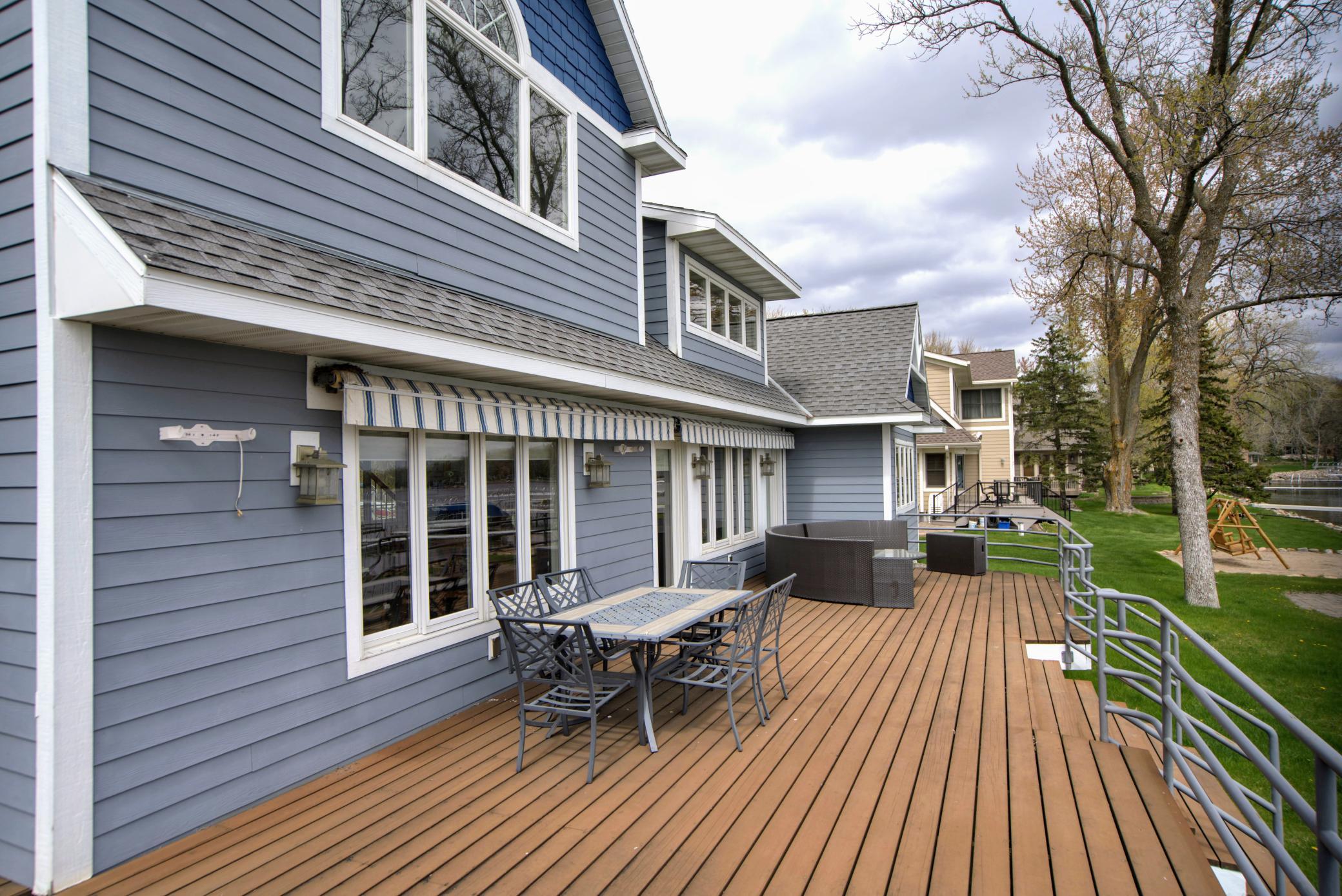 Additional deck view—open skies and sparkling water, the essence of lake living.