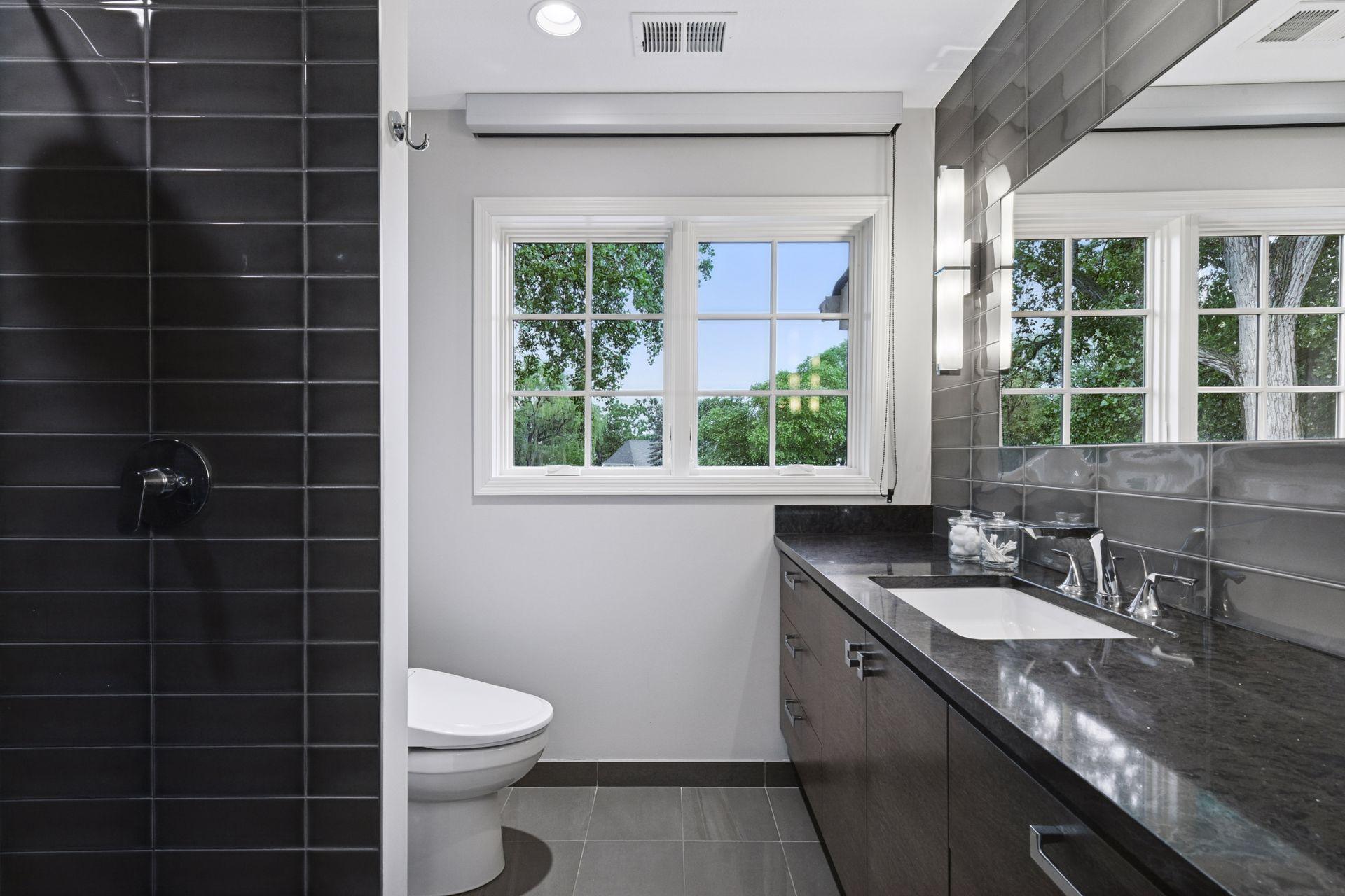 2nd Primary Bathroom offering long lake views