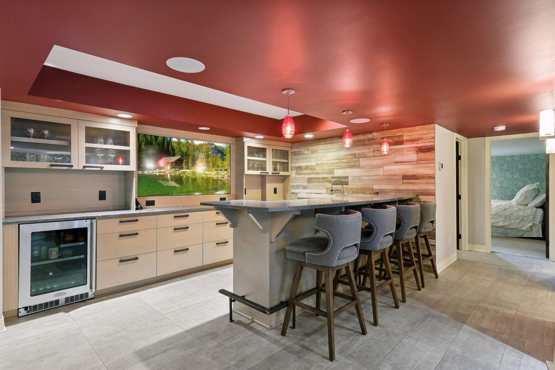 Full wet bar with ice maker, beverage refrigerator and plenty of cabinetry for storage