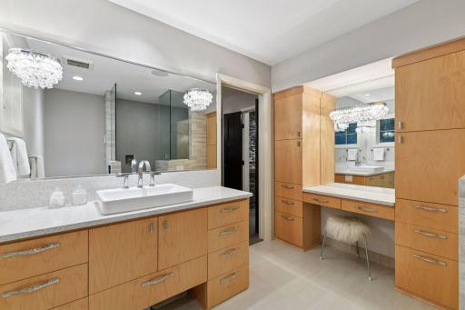 1 of 2 Primary Bathrooms. Both elevated by Cambria counters, decorative lighting and heated floors.