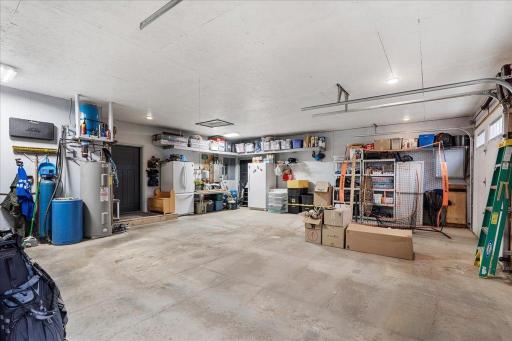 Attached garage with almost a 3rd stall for a workshop