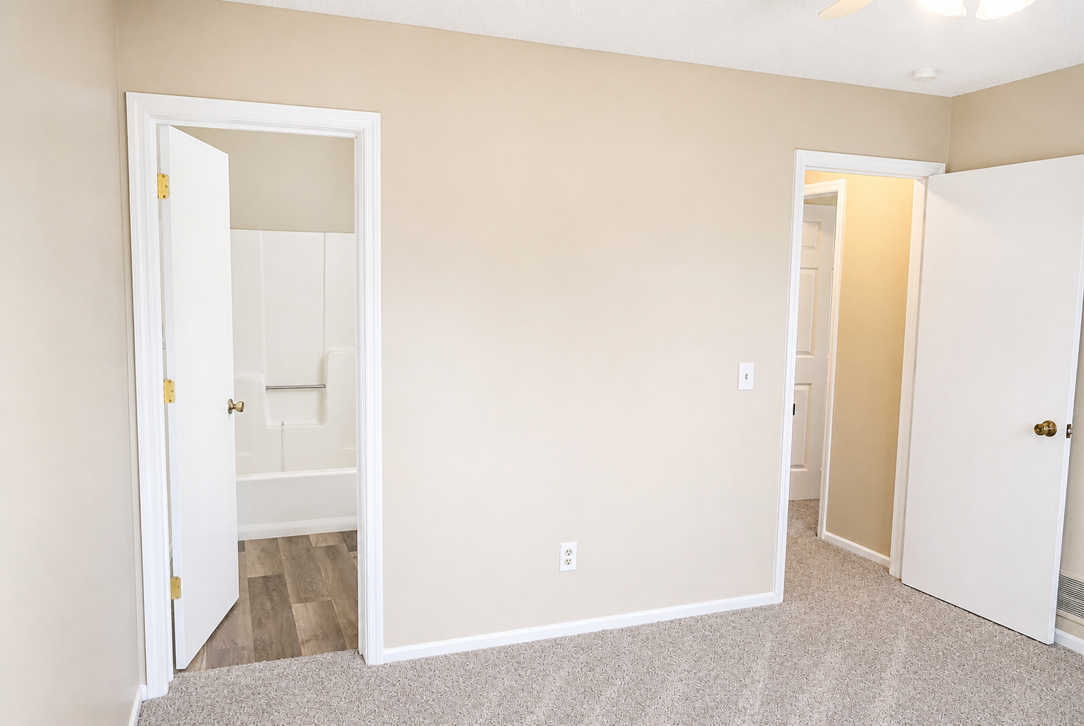 Bedroom 1 - Through door to main level bath.png