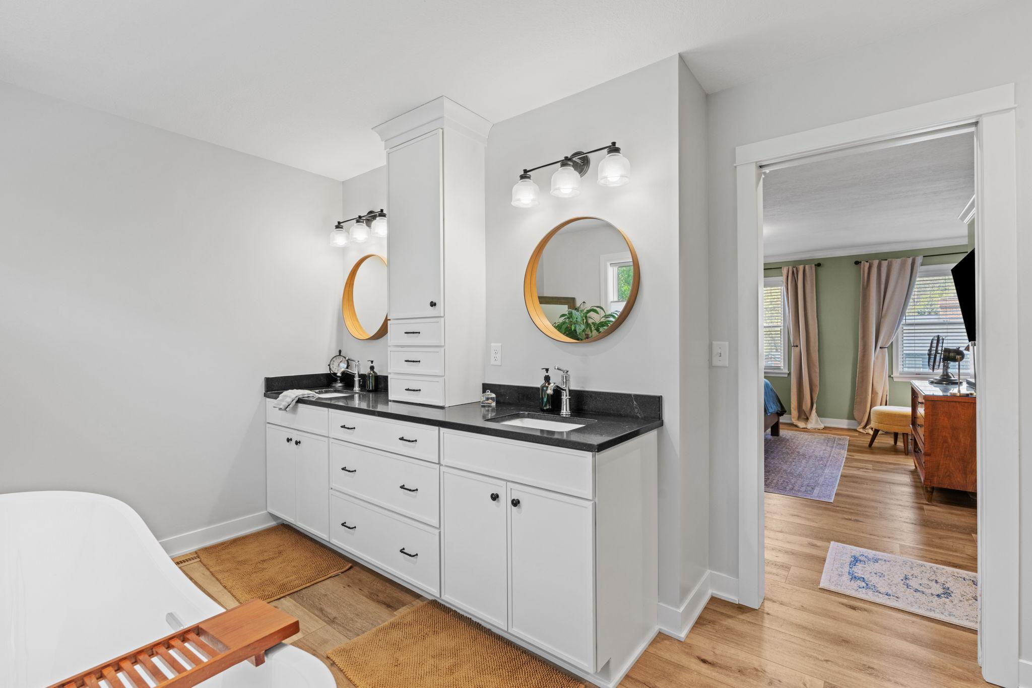 Fully renovated primary bathroom with double sinks.jpg