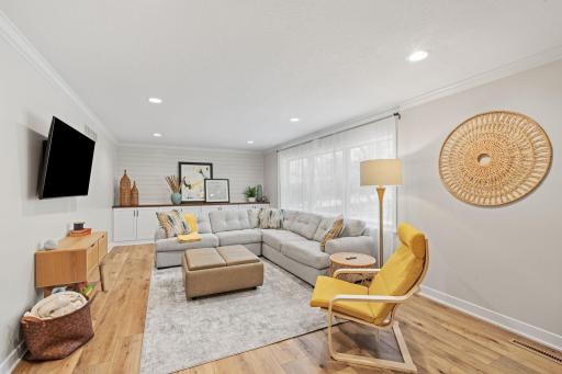 Large family room off dining and kitchen, perfect for entertaining or a relaxing night in