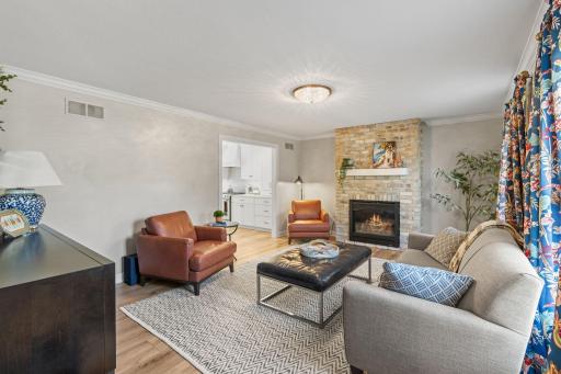 Spacious living room with a new gas burning fireplace