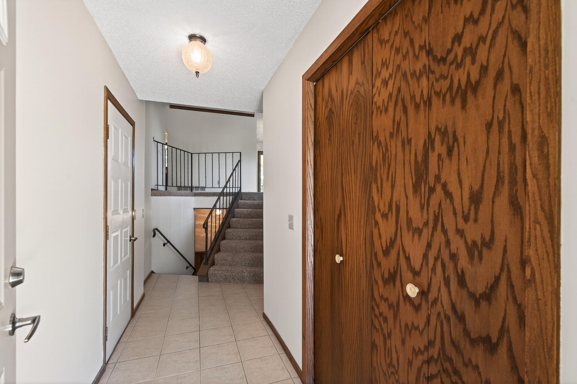 Large foyer with dual entrance from garage and front door