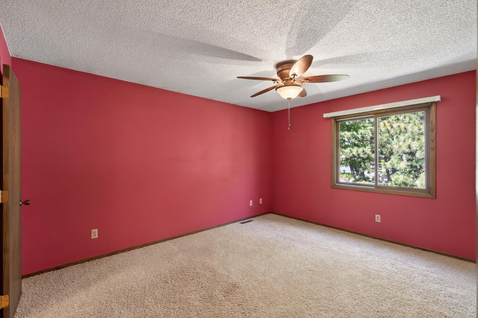 Large primary suite has a walk through bathroom attached