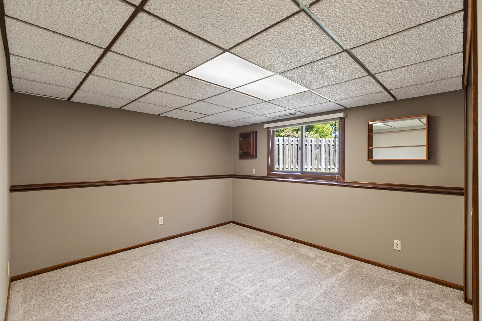 Lower level amusement room could also be an exercise room, or even a 4th bedroom with a little work.