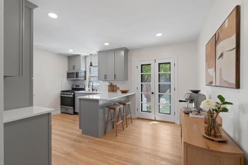 Kitchen Remodel Added Counter Seating, Peninsula & More!