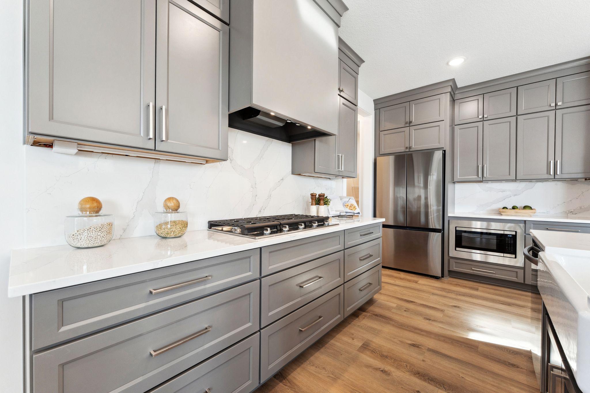 Kitchen with Quartz Backsplash