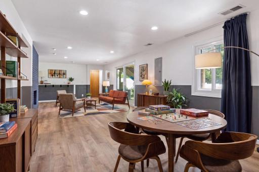 Virtually staged walkout level family/recreation rooms