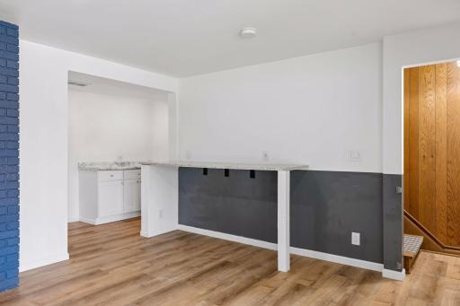 Walk-up bar area with counter and beverage cooler