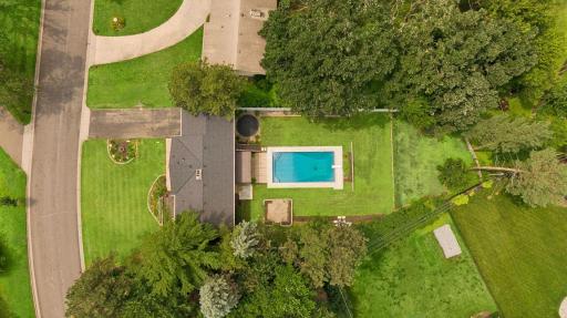 With one of the largest lots in the neighborhood, this home offers so much potential in the level backyard.